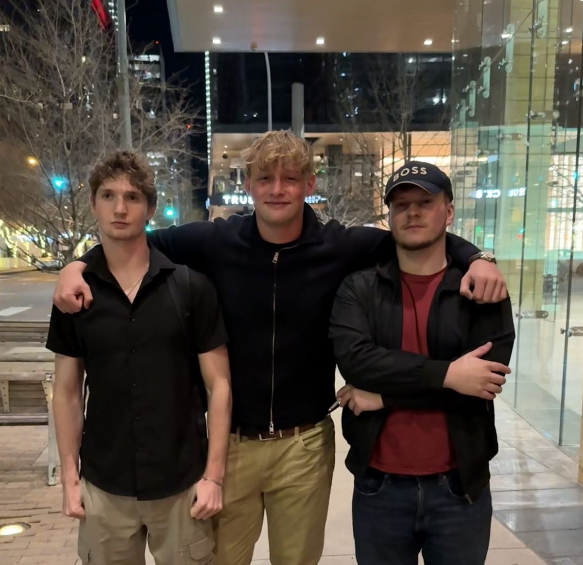 Charlie and the team on a city street at night
