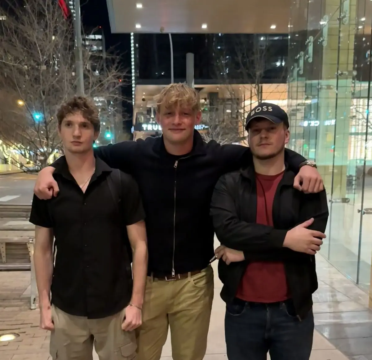 Charlie and the team on a city street at night